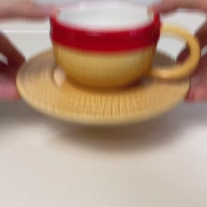 Flipping the Luffy and Chopper cups onto their saucers to make the hats